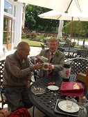 Ken presenting an OTT mug to the late Jimmy Harris